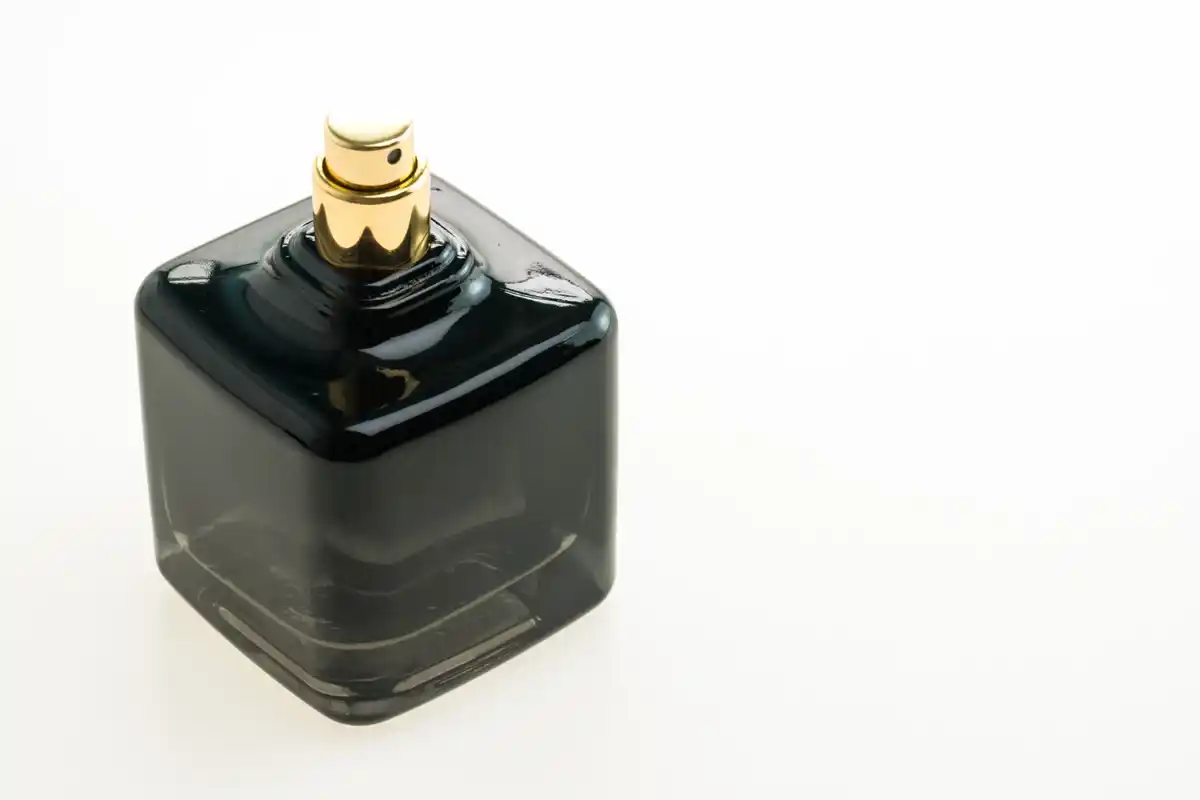 cara membuka tutup botol parfum press