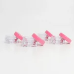 KEMASAN KOSMETIK BENING TRANSPARAN DENGAN CAP PINK