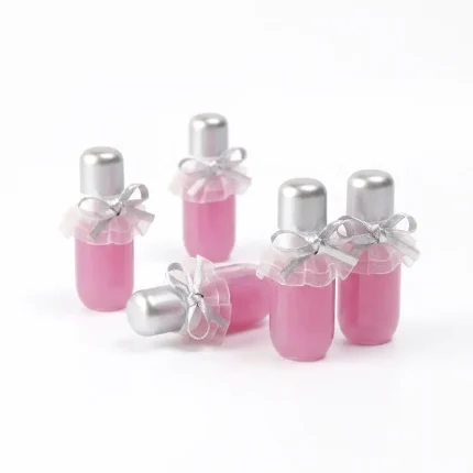 kemasan botol lip gloss ukuran kecil dengan dekorasi pita premium