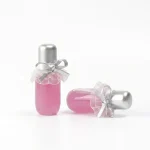 kemasan kosmetik BOTTLE LIP D177 varian warna pink dengan cap silver