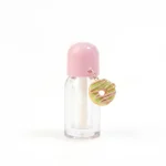 kemasan kosmetik BOTTLE LIP D588 varian warna bening transparan dengan cap pink & gantungan donat