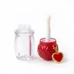 kemasan kosmetik BOTTLE LIP D628 varian warna bening transparan dengan tutup cap merah