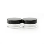 kemasan kosmetik POT POWDER M100 varian warna bening transparan dengan cap hitam