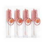 kemasan botol lip gloss bentuk silinder satu sisi dengan aplikator tebal dan gantungan kunci lucu