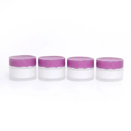 kemasan kosmetik bentuk silinder dengan cap motif bunga