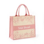 merchandise COTTON CANVAS TOTTE BAG 11 varian warna cream dengan aksen pink